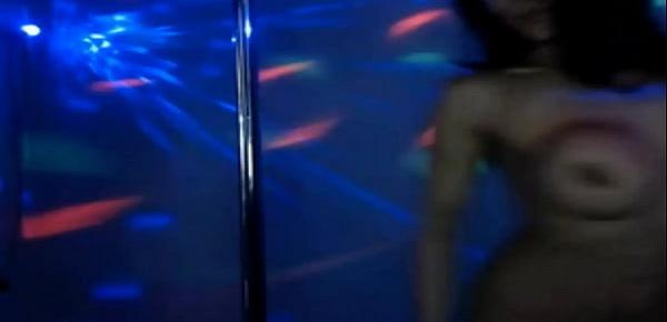  Big tits model is displayed in the nightclub